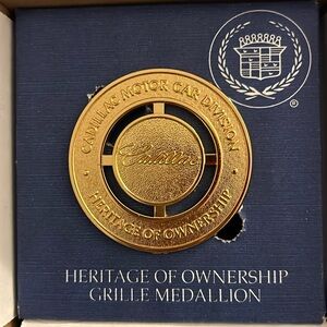 Gold Heritage of Ownership grille medallion